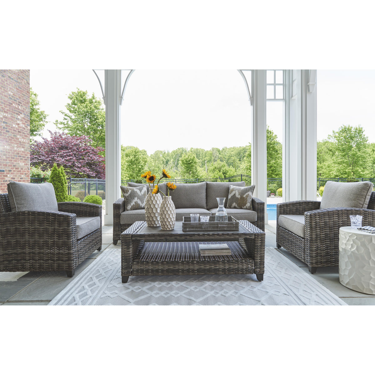 Signature Design by Ashley Oasis Court P335-081 Sofa/Chairs/Table Set IMAGE 7